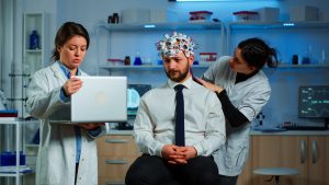 two doctors are treating a patient